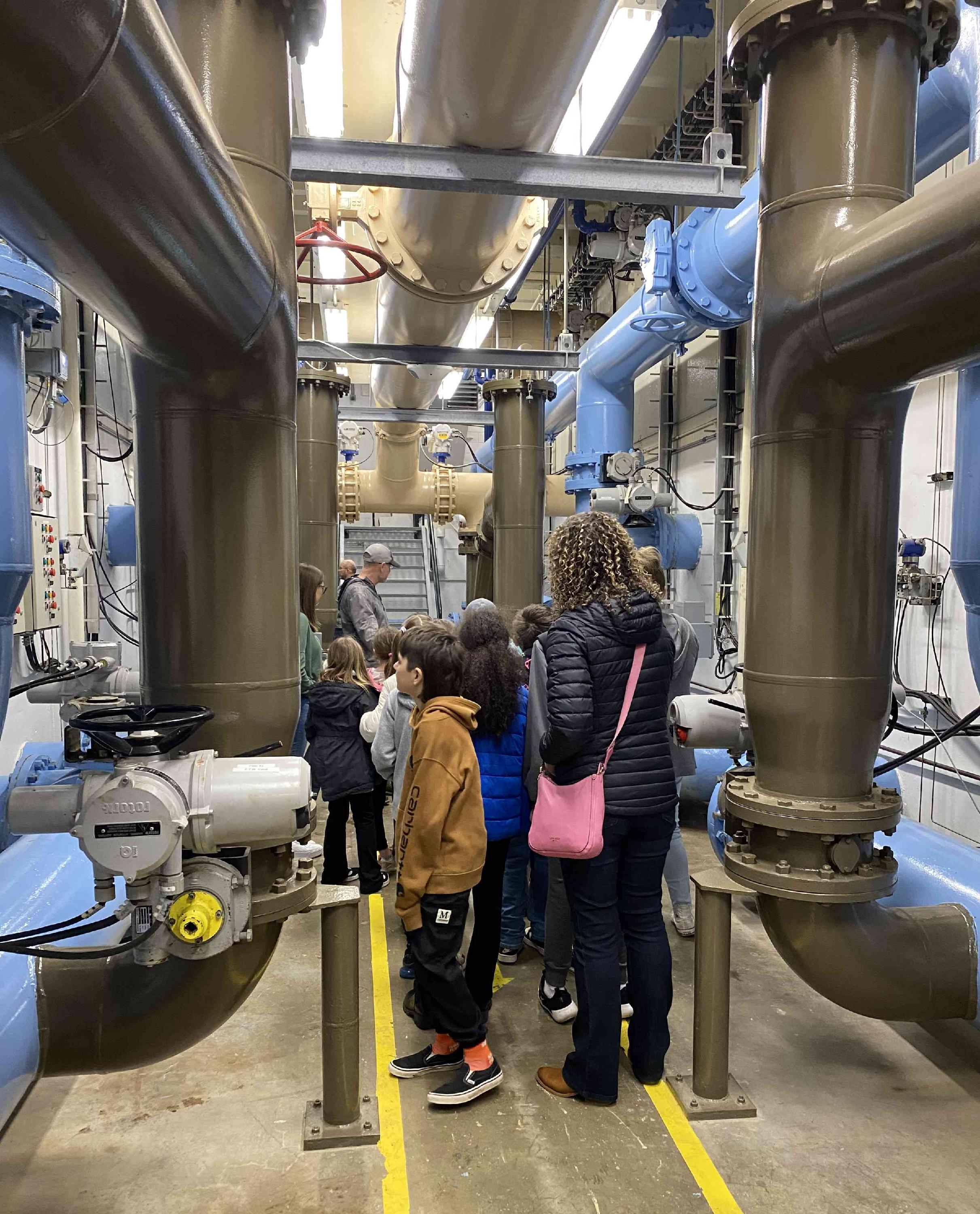 Kids touring South Fork's water treatment plant